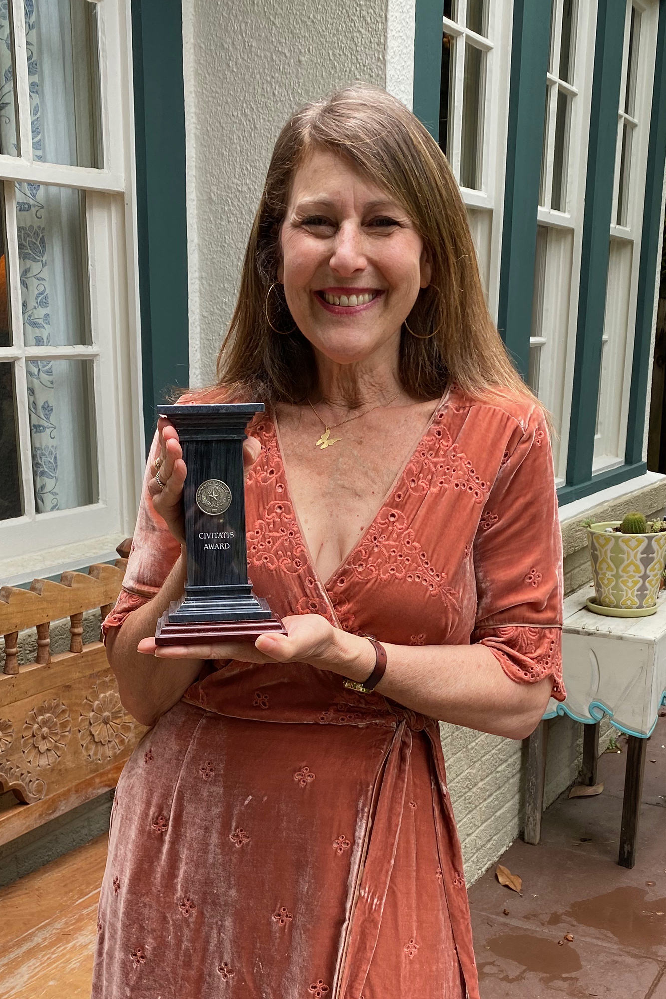 Lori Holleran Steiker with her award